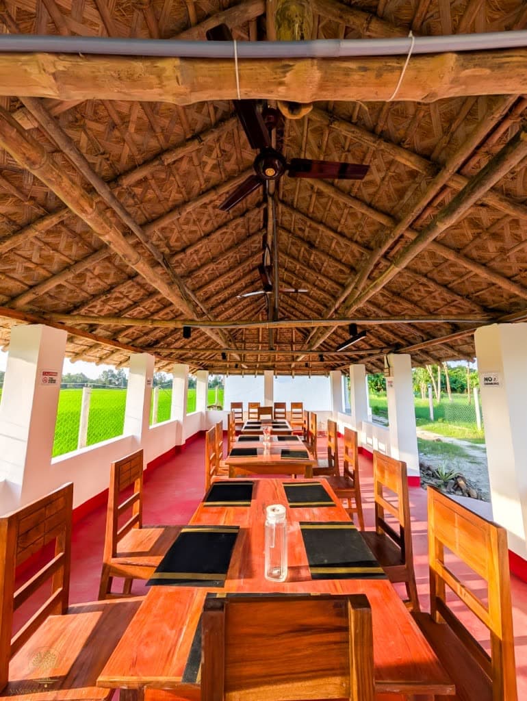 Thatched dining pavilion at Mangrove Forest Camp Sundarban eco stay